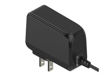 Un buen precio. Fuente de alimentación negra/blanca de la transferencia del enchufe del diente 12V 2A los E.E.U.U. del adaptador 2 de la CA DC en línea