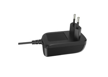 Un buen precio. Adaptador del soporte de la pared de la transferencia de la CA del enchufe 18W 12V 1.5A de la UE con el CE/aprobaciones del GS/del EMC en línea
